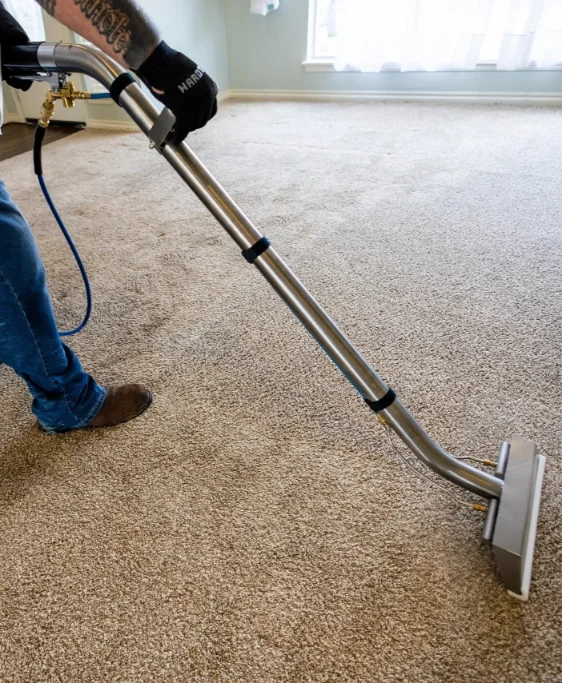 Cleaning carpet with a professional extraction wand