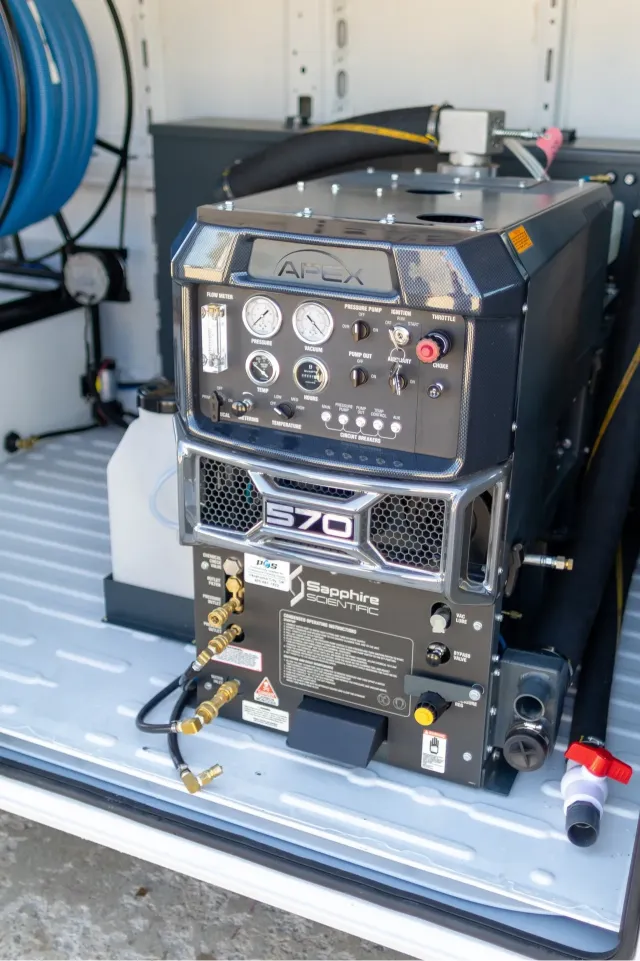 APEX 570 truck-mount carpet cleaning rig in the van